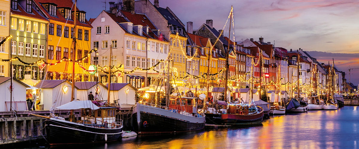 Christmas lights illuminating the canals of Nyhavn in Copenhagen, Denmark